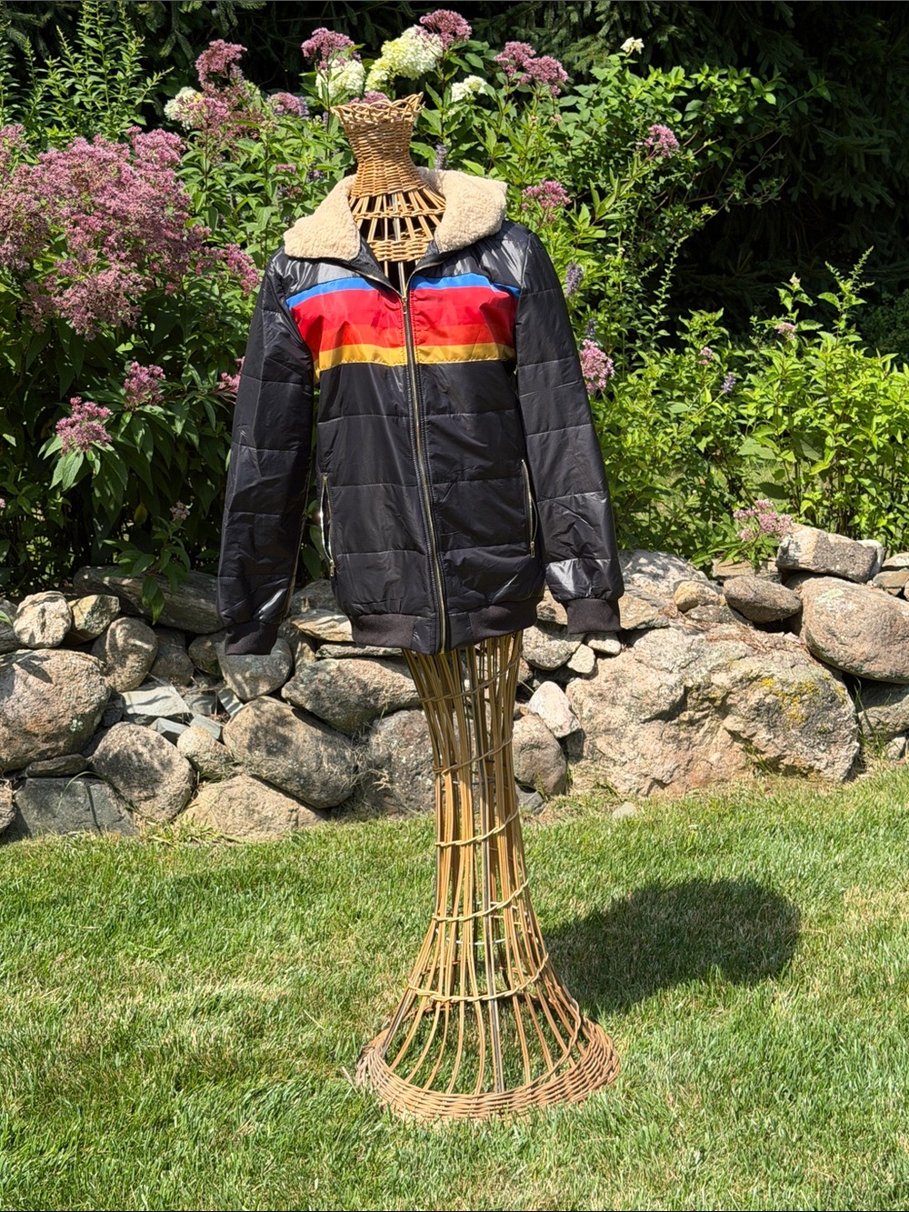 SHEIN Black Puffer Jacket with Red, Blue, and Yellow Stripes